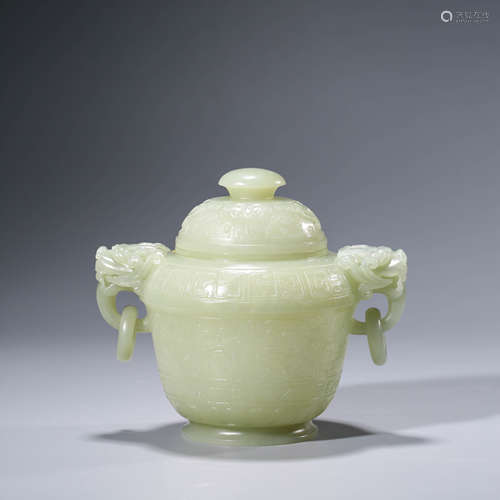 A Carved White Jade Loop-Handle Jar And Cover