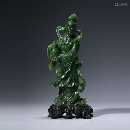 A Carved Spinach-Green-Jade Figure Ornament