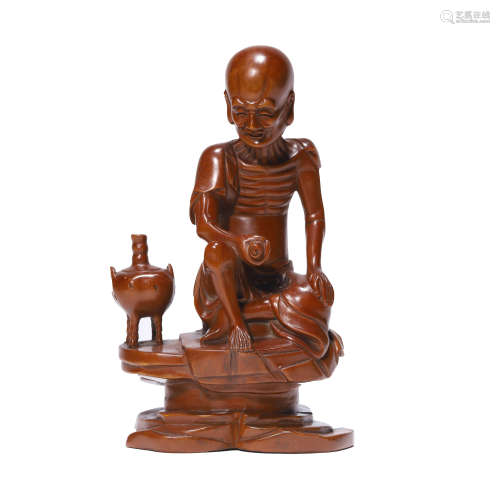 A Carved Boxwood Figure Ornament