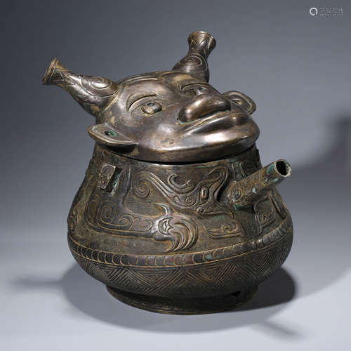 A Bronze Figural Dragon Vessel, He