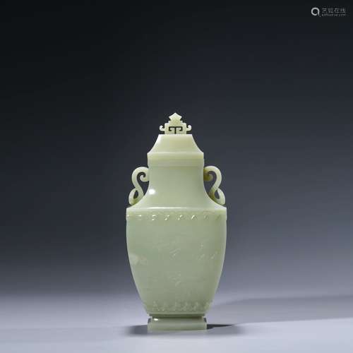 A Carved White Jade Double Loop-Eared Vase And Cover