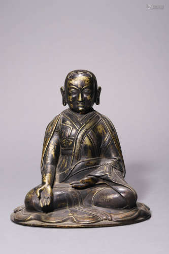 A Gilt Bronze Seated Lama Figure Possibly Ming Dynasty