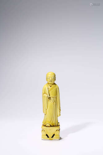 A Yellow Glazed Porcelian Figure, Qing Dynasty