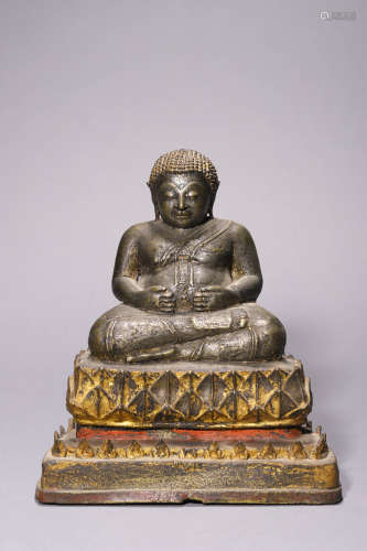 A Gilt Bronze Seated Lama Figure