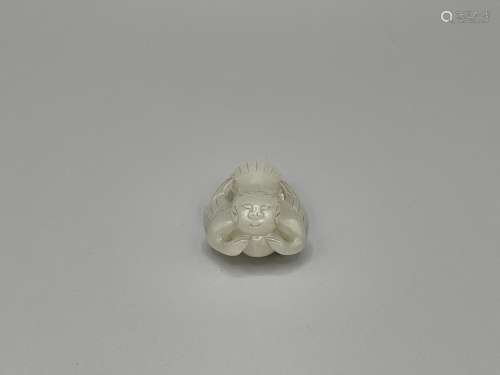 A Carved White Jade Garuda