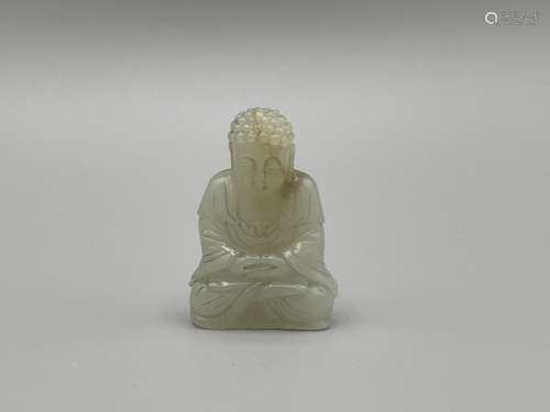 A Small Carved White Jade Figure of A Seated Buddha