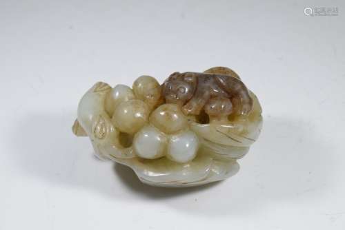 A Carved White Jade Grape and Squrrel