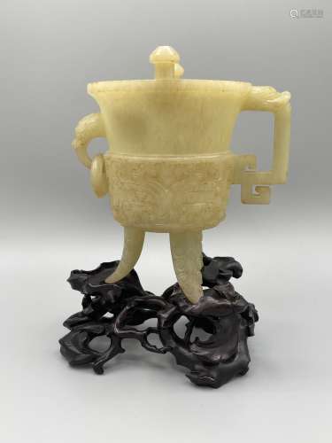 A Carved Yellow Jade Archic Jue Cup