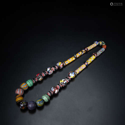 A GROUP OF CHINESE GLAZED BEADS, TANG DYNASTY