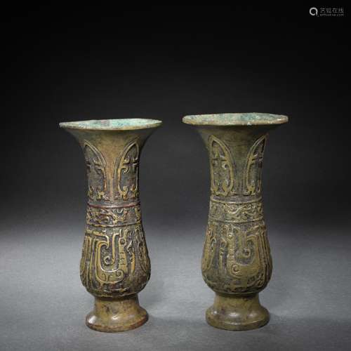 A PAIR OF CHINESE BRONZE WINE ZHI, WEST ZHOU DYNASTY