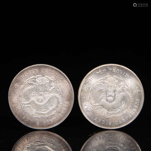 A PAIR OF CHINESE STERLING SILVER COINS, QING DYNASTY