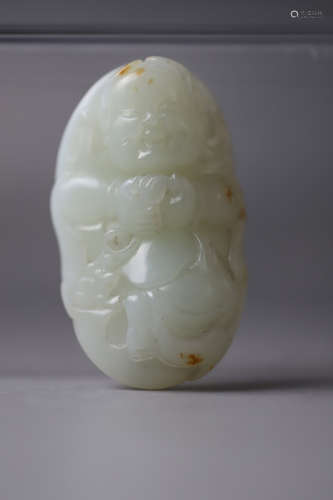 A White Jade Man with Toad Ornament