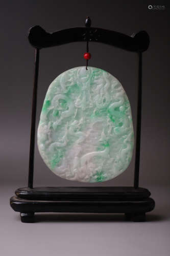A Double Carved Fish & Dragon Pattern Jadeite Pendant