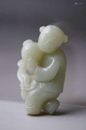 A Child Holding Ball Jade Ornament