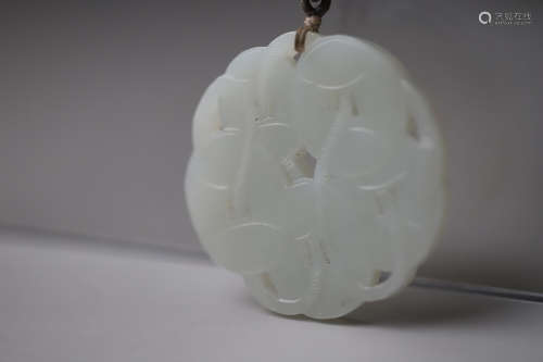 A White Jade Five Coin Pattern Pendant