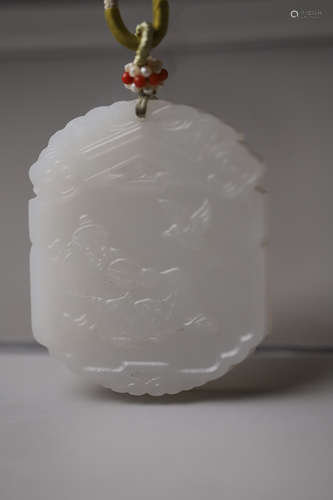 A White Jade Double Carved Man and Phoenix Pendant