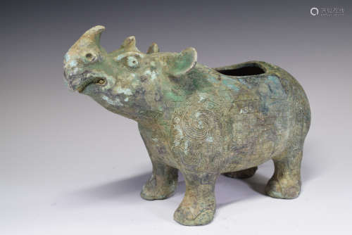 A Chinese Bronze Rhino Shape Container