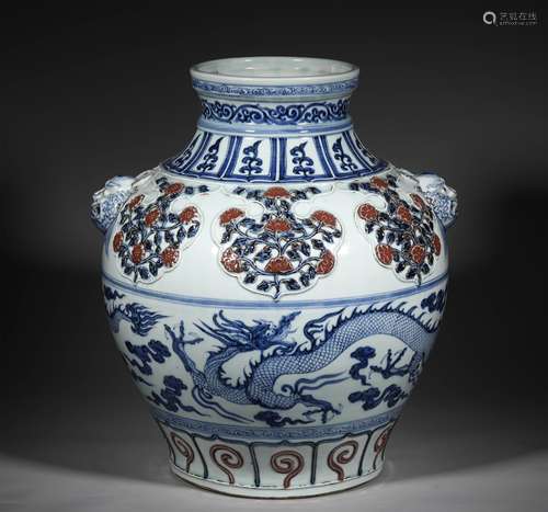 A YUAN DYNASTY BLUE AND WHITE UNDERGLAZE RED DRAGON GRAIN JA...