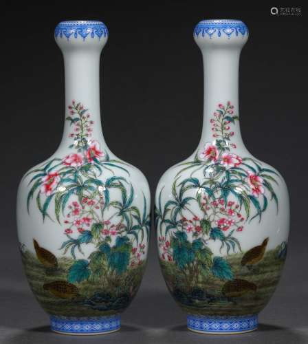 A PAIR OF QING DYNASTY FAMILLE ROSE LIVE AND WORK BOTTLES