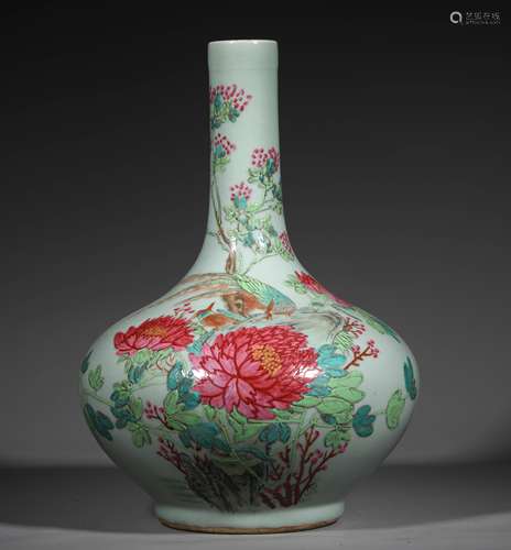 A QING DYNASTY HOLLY GLAZE FAMILLE ROSE FLOWER AND BIRD VASE