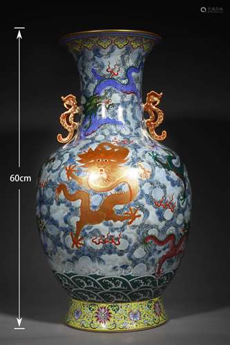 A QING DYNASTY FAMILLE ROSE DRAGON GRAIN ZUN