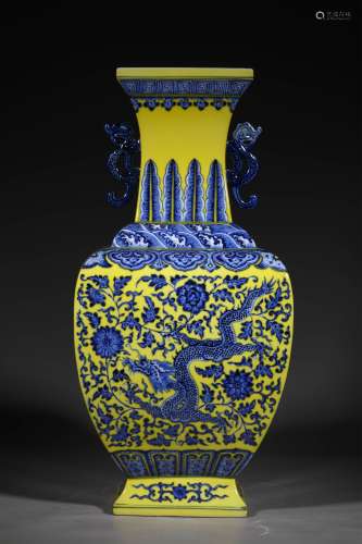 A QING DYNASTY YELLOW GROUND BLUE AND WHITE DRAGON GRAIN VAS...