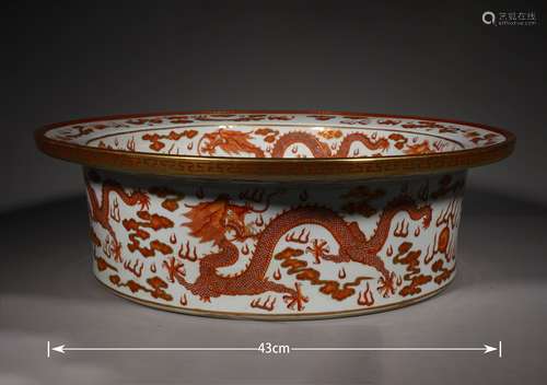 A QING DYNASTY IRON-RED DRAGON GRAIN BASIN