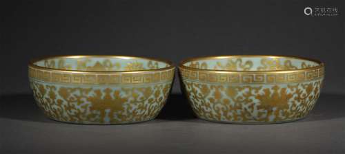 A PAIR OF HOLLY GLAZE GOLD DRAWING WASHERS