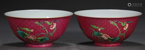 A PAIR OF QING DYNASTY CARMINE COLOR FAMILLE ROSE LOTUS CUPS