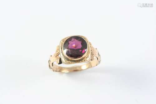 A GARNET SINGLE STONE RING the circular-cut garnet is set in...