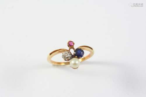 A SAPPHIRE, RUBY, DIAMOND AND PEARL RING mounted with a circ...