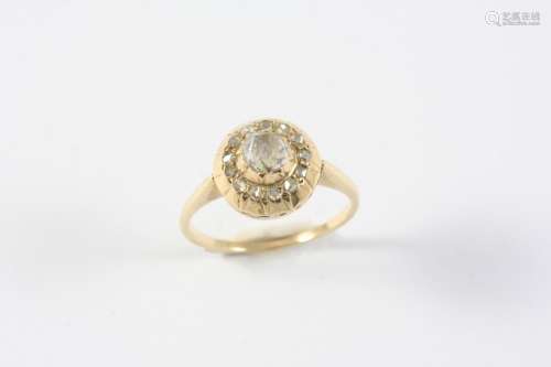 A DIAMOND CLUSTER RING the central rose-cut diamond is set w...