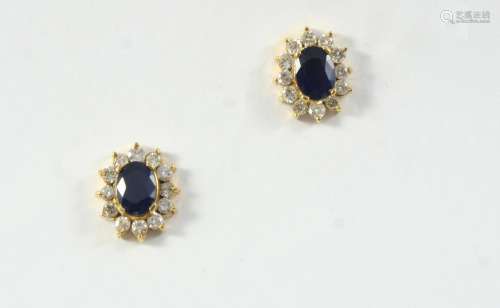 A PAIR OF SAPPHIRE AND DIAMOND CLUSTER STUD EARRINGS each ea...