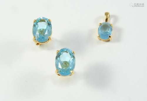 A PAIR OF BLUE TOPAZ STUD EARRINGS each earring set with an ...