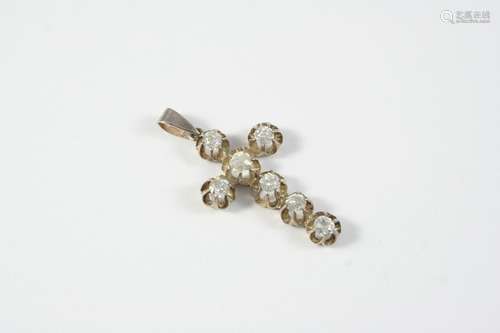 A DIAMOND CRUCIFORM PENDANT mounted with circular old-cut di...