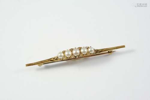 A PEARL AND DIAMOND BROOCH the five graduated half pearls ar...