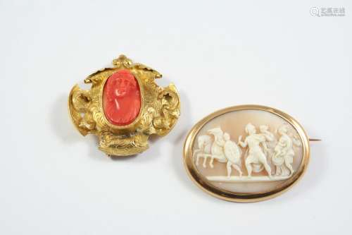 A CARVED CORAL CAMEO BROOCH depicting a classical woman, mou...