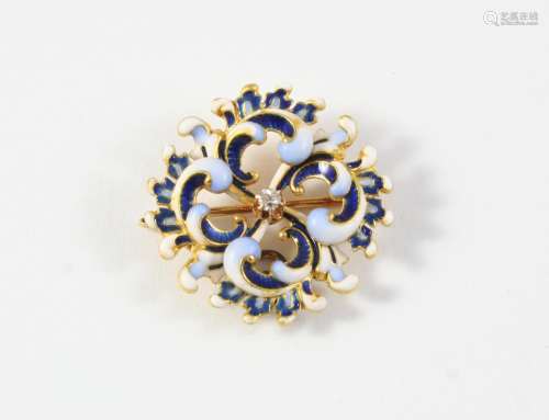 AN ENAMEL AND DIAMOND BROOCH PENDANT centred with a circular...