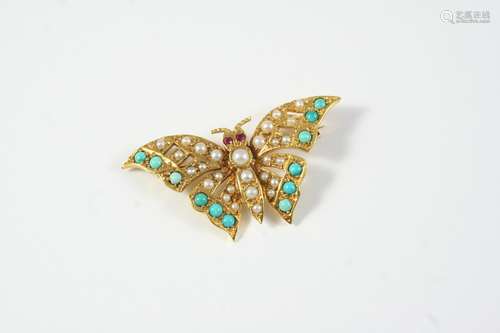 A TURQUOISE AND PEARL BUTTERFLY BROOCH formed with four grad...