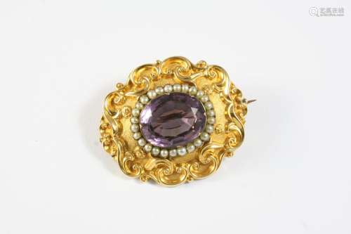 A VICTORIAN GOLD, AMETHYST AND PEARL SET BROOCH the oval-sha...