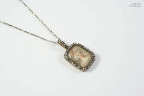 AN EARLY VICTORIAN DIAMOND LOCKET PENDANT depicting the head...