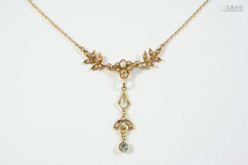 A VICTORIAN PEARL AND AQUAMARINE NECKLET of foliate form, se...