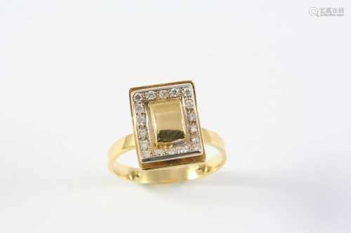 A DIAMOND AND GOLD RING the rectangular-shaped 18ct gold mou...