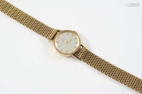 A LADY'S 9CT GOLD WRISTWATCH BY OMEGA the signed circular di...