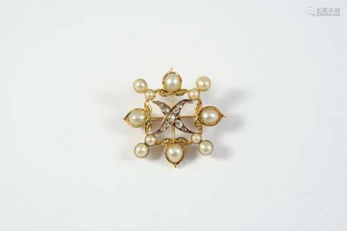 A DIAMOND AND PEARL QUATREFOIL BROOCH mounted with rose-cut ...