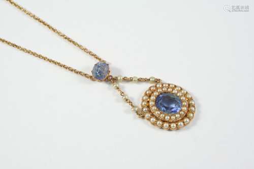 AN EARLY 20TH CENTURY SAPPHIRE AND PEARL CLUSTER PENDANT the...
