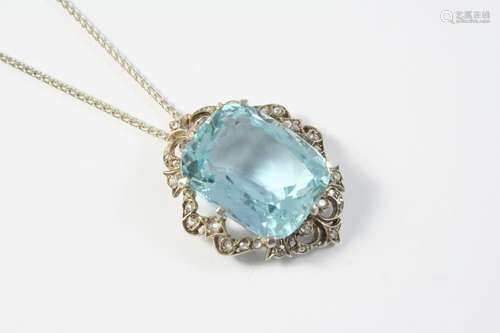 AN AQUAMARINE AND DIAMOND PENDANT the rounded rectangular-sh...