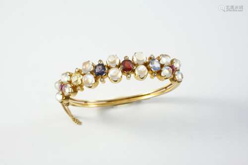 A GOLD, MOONSTONE, DIAMOND AND GEM SET HALF HINGED BANGLE mo...