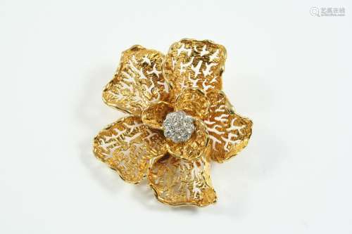 A GOLD AND DIAMOND FLOWERHEAD BROOCH the textured yellow gol...