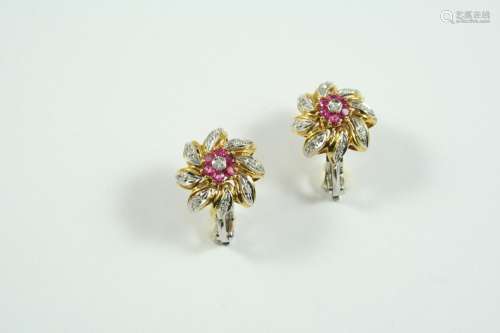 A PAIR OF RUBY AND DIAMOND EARCLIPS of flowerhead form, each...
